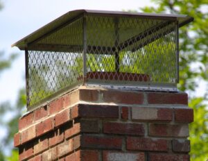 Chimney top with a metal chimney cap.
